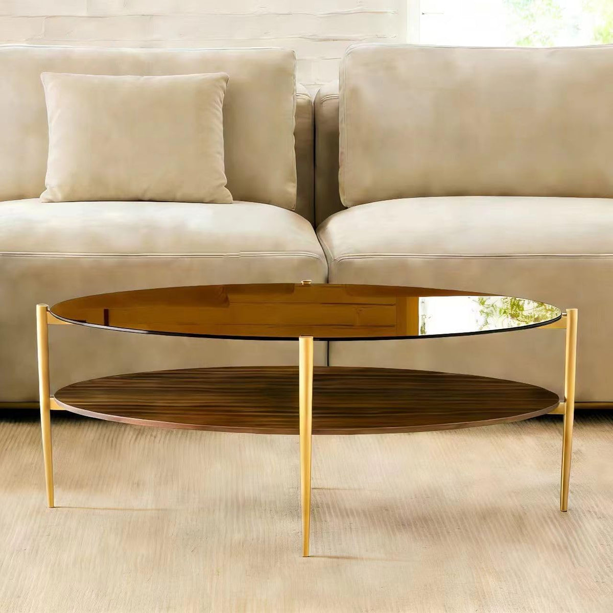 Shrine Oval Coffee Table, Mid-Century Modern Design, 2-Tier Structure, Amber Glass Top and Walnut MDF Shelf, 47" D x 21" W x 17" H, Sleek Conical Metal Legs with Gold Finish